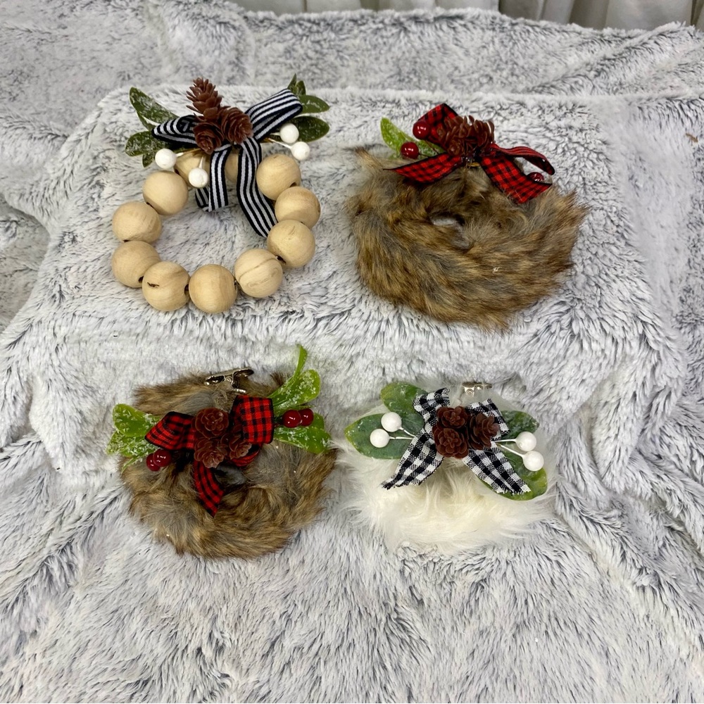 Set of 4 faux fur ornaments with clip fasteners.